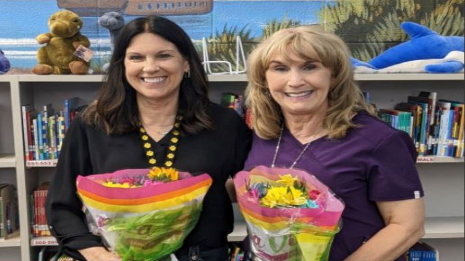 pictured from left to right Sue Weaver, teacher of the year and Janelle Koziara, classified employee of the year